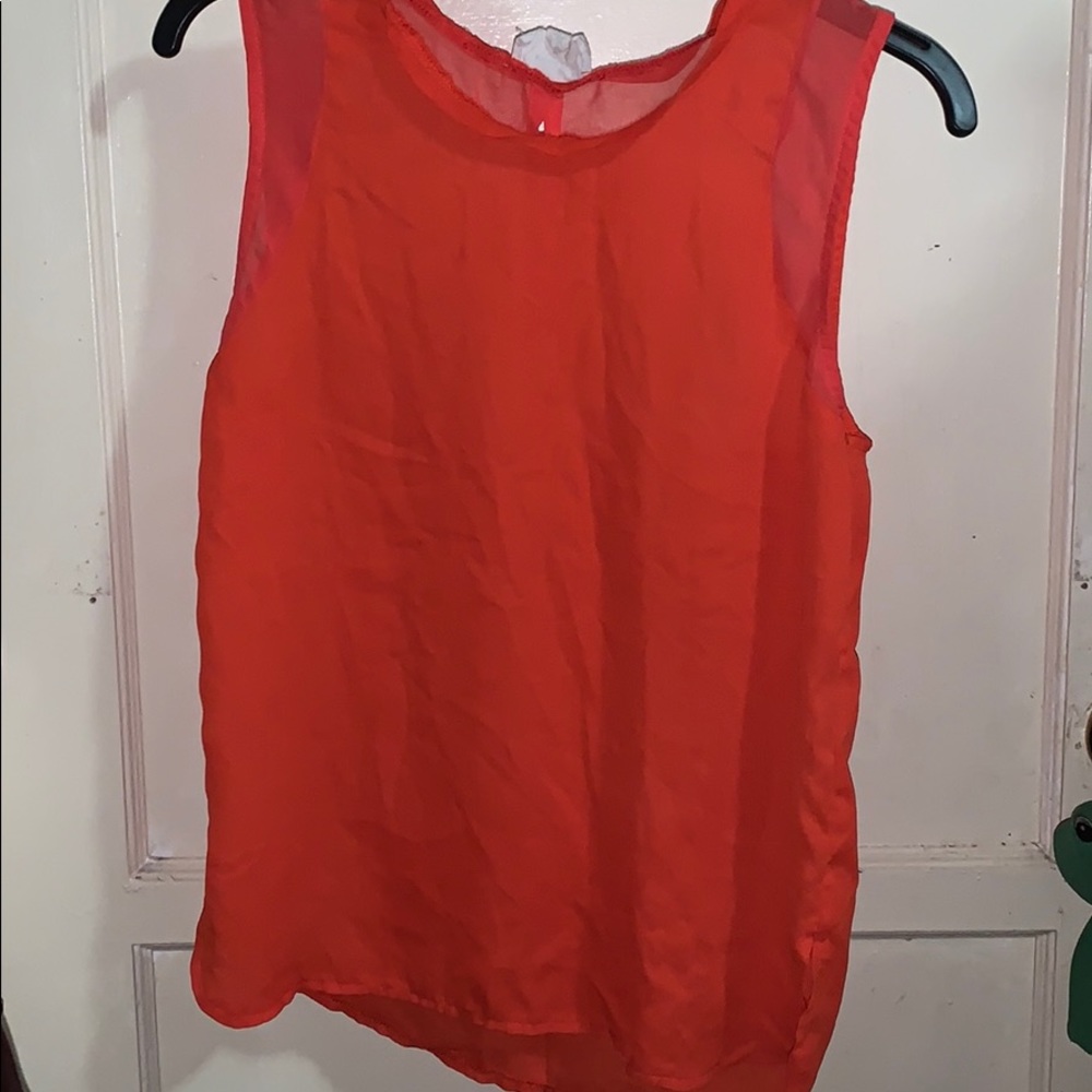 Orange top with open back